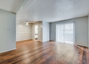 Thumbnail 8 of 16 - the spacious living room and dining room of an apartment
