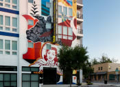 Thumbnail 3 of 24 - a mural on the side of a building