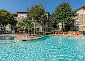 Thumbnail 12 of 39 - Swimming pool at Woodbridge Villas Apartments, Sachse, 75048