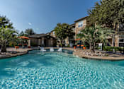 Thumbnail 13 of 39 - Blue Cool Swimming Pool at Woodbridge Villas Apartments, Sachse