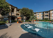 Thumbnail 14 of 39 - Lounging By The Pool at Woodbridge Villas Apartments, Texas, 75048