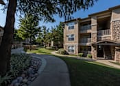 Thumbnail 38 of 39 - Exterior view at Woodbridge Villas Apartments, Sachse, Texas