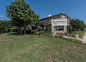 Thumbnail 32 of 39 - Large grassy area at Woodbridge Villas Apartments, Sachse, TX