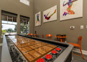 Thumbnail 22 of 39 - Shuffleboard table at Woodbridge Villas Apartments, Texas, 75048