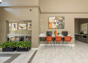 Thumbnail 26 of 39 - Clubhouse with dining area at Woodbridge Villas Apartments, Sachse, TX, 75048
