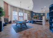 Thumbnail 15 of 54 - a spacious game room with a pool table and ping pong table