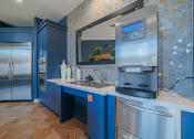 Thumbnail 17 of 54 - a kitchen with a refrigerator freezer and a sink