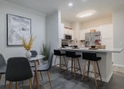 Thumbnail 3 of 54 - a kitchen and dining area in a 555 waverly unit