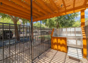 Thumbnail 41 of 54 - our apartments showcase a beautiful screened in porch with a hot tub