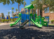 Thumbnail 39 of 54 - a playground at the whispering winds apartments in pearland, tx