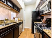 Thumbnail 3 of 30 - kitchen in austin texas apartments