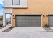 Thumbnail 21 of 24 - a garage door on the side of a house