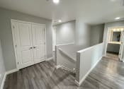 Thumbnail 34 of 46 - the landing of a new home with white doors and a staircase