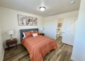 Thumbnail 6 of 46 - an overhead view of a bedroom with a bed and a bathroom