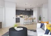 Thumbnail 9 of 24 - a living area with a sofa coffee table and a kitchen in the background