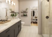 Thumbnail 11 of 24 - a bathroom with a large vanity and a walk in shower in a 555 waverly unit