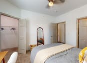 Thumbnail 9 of 22 - a bedroom with a large bed and two closets