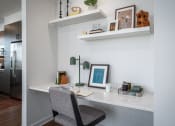 Thumbnail 5 of 22 - a home office with a desk and a chair