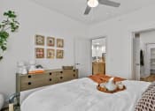 Thumbnail 5 of 47 - a bedroom with a large bed and a closet