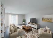 Thumbnail 1 of 29 - A living room with a couch, chair, and television.