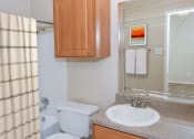 Thumbnail 8 of 21 - a bathroom with a sink toilet and shower