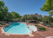 Thumbnail 11 of 21 - take a dip in the resort style pool at villas at houston levee west apartments