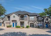 Thumbnail 42 of 43 - A large, modern house with the number 23 on the front.