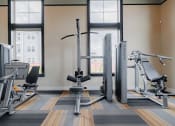 Thumbnail 35 of 43 - a fitness center with treadmills and other exercise equipment