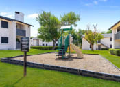 Thumbnail 13 of 16 - a playground at the whispering winds apartments in pearland, tx