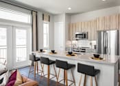 Thumbnail 2 of 30 - kitchen with barstools
