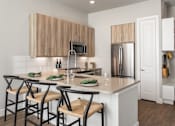 Thumbnail 9 of 30 - kitchen island with barstools