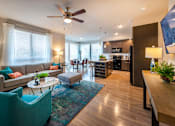 Thumbnail 4 of 25 - a living room and kitchen in an apartment