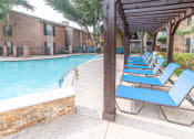 Thumbnail 29 of 37 - our apartments have a swimming pool with chaise lounge chairs