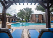 Thumbnail 30 of 37 - our apartments have a large pool and lounge chairs