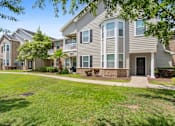 Thumbnail 42 of 42 - exterior of apartments with lawn area