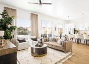 Thumbnail 4 of 18 - a living room with white walls and hardwood floors