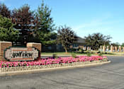 Thumbnail 16 of 44 - the sign for the golf view neighborhood in front of a flower garden