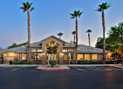 Thumbnail 15 of 16 - A building with a palm tree in front of it.