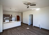 Thumbnail 40 of 50 - A room with a ceiling fan and a wooden floor at Denver Metro Village Apartments, Denver, Colorado