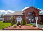 Thumbnail 1 of 37 - exterior view of leasing center at Shady Oak Village - Senior Living Apartments, IN, 47802