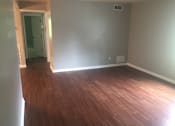 Thumbnail 5 of 8 - Living room at Penn Park Apartments in Meridian-Kessler neighborhood.