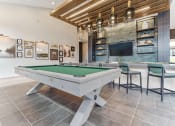 Thumbnail 25 of 38 - play a game of pool on our billiards table in our game room  at Plat 4 at Research Triangle, North Carolina