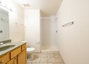 Thumbnail 26 of 32 - a bathroom with a toilet sink and bathtub at 26 West, Managed by Buckingham Urban Living, Indianapolis