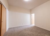 Thumbnail 19 of 32 - a bedroom with white walls and carpet at 26 West, Managed by Buckingham Urban Living, Indianapolis