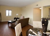 Thumbnail 13 of 18 - Living Room With Dining Area at The Ambassador at Library Square, Indiana, 46204