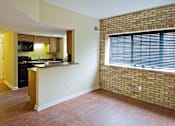 Thumbnail 9 of 18 - Kitchen and Living Room at The Ambassador at Library Square, Indianapolis