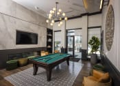 Thumbnail 15 of 53 - a pool table in a lobby of a hotel