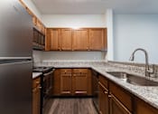 Thumbnail 2 of 40 - Empty kitchen at Altitude at Blue Ash, Blue Ash, OH, 45242