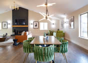 Thumbnail 14 of 38 - Clubroom With Smart Tv And Fireplace at Bradford Ridge Apartments, Bloomington, IN, 47403