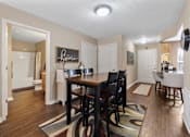 Thumbnail 5 of 36 - Open dining room at Heritage Trail Apartments in Terre Haute, IN.